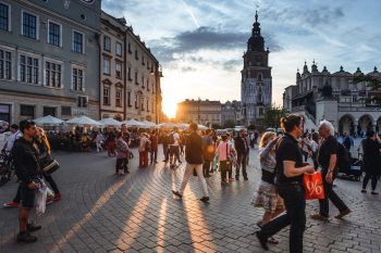 A crowd of shoppers in a street.