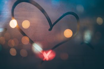 A love heart drawn on a window.