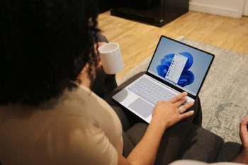 A woman using a laptop computer.